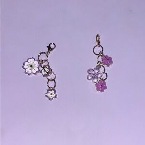 Purple white and gold keychains